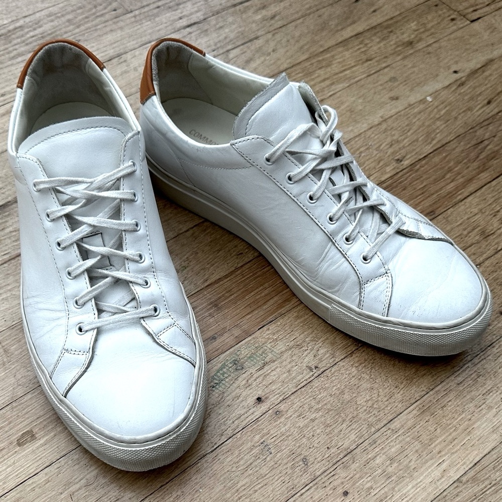Men’s Common Projects. Leather Achilles Retro Low in White with brown heel tab.